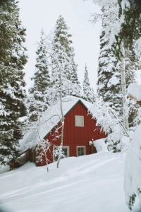 Mountain cabin in the snow